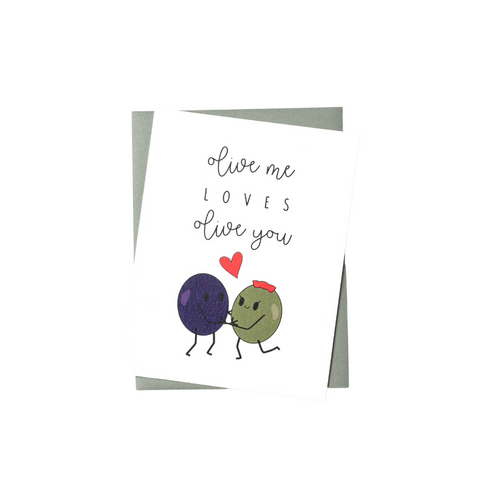 love card with illustration of a green olive and a black olive holding hands and looking at each other adoringly with a heart bubble between them.